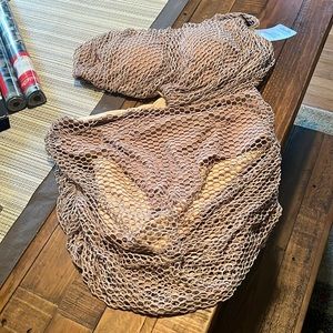 one piece with flattering net overlay. Worn once.